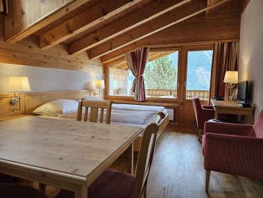 Wohn- und Schlafzimmer - Aparthotel Muchetta