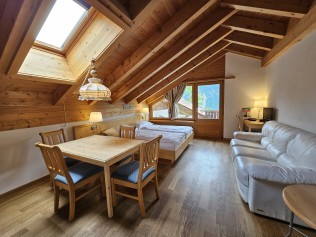 Wohn- und Schlafzimmer - Aparthotel Muchetta