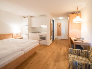Wohn- und Schlafzimmer - Aparthotel Muchetta