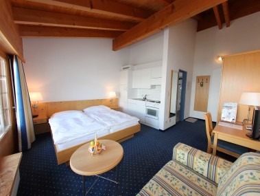 Wohn- und Schlafzimmer - Aparthotel Muchetta