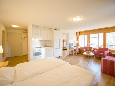 Wohn- und Schlafzimmer - Aparthotel Muchetta