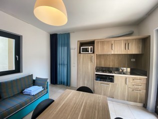 Wohnzimmer mit Essbereich - Belvedere Village