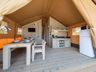 Salon avec coin repas - Camping Vendrell Platja