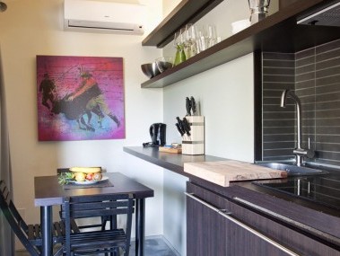 Küche mit Essbereich - Camping Village Le Rocchette