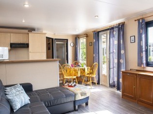 Wohnzimmer mit Essbereich - Campingvillage / Residence Les Mûriers