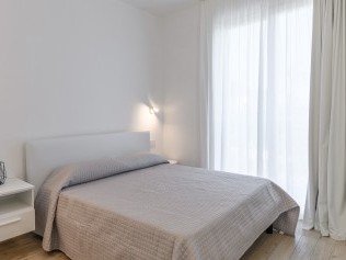 Schlafzimmer - Capo Falcone Charming Apartments