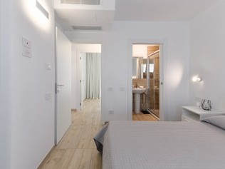 Schlafzimmer - Capo Falcone Charming Apartments