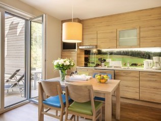 Salon avec coin repas - Center Parcs Park Allgäu