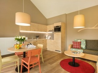 Salon avec coin repas - Center Parcs Park Allgäu