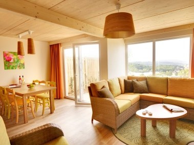 Wohnzimmer mit Essbereich - Center Parcs Park Bostalsee