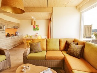 Salon avec coin repas - Center Parcs Park Bostalsee