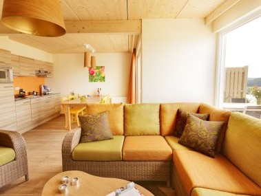 Wohnzimmer mit Essbereich - Center Parcs Park Bostalsee