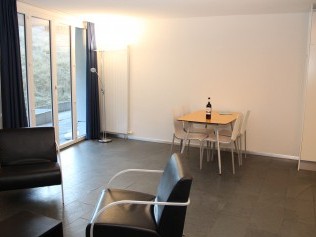 Salon avec coin repas - Maison de vacances Chalet de la Foret