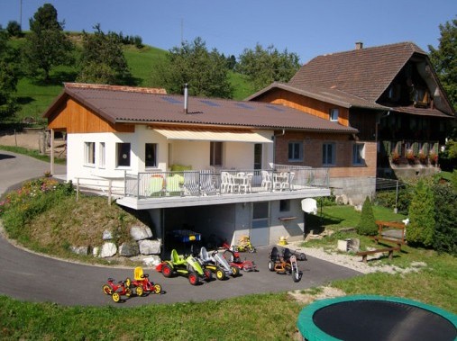 Exterior view in summer - Adventure farmyard Farnere Swiss-Lodge