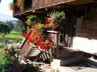 Eingang - Erlebnishof Farnere Swiss-Lodge