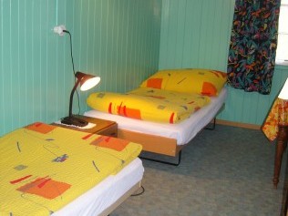 Schlafzimmer - Erlebnishof Farnere Swiss-Lodge