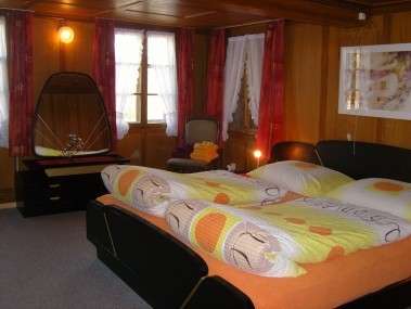 Schlafzimmer - Erlebnishof Farnere Swiss-Lodge