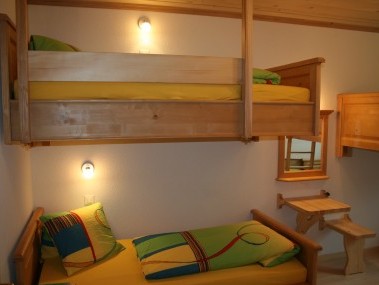 Schlafzimmer - Erlebnishof Farnere Swiss-Lodge