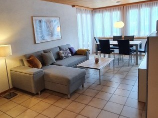 Living room with dining area - Holiday house Adler de la Gare