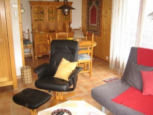 Wohnzimmer mit Essbereich - Ferienhaus Aiglon