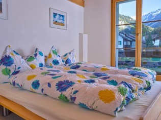 Schlafzimmer - Ferienhaus Albulablick