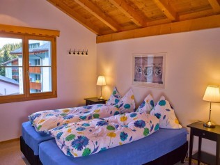 Schlafzimmer - Ferienhaus Albulablick