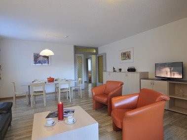 Wohnzimmer mit Essbereich - Ferienhaus Alte Post