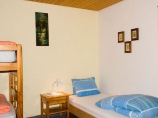 Schlafzimmer - Ferienhaus Belmunt