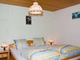 Schlafzimmer - Ferienhaus Belmunt