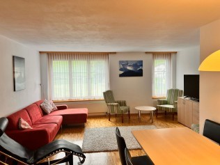 Wohnzimmer mit Essbereich - Ferienhaus Belvair