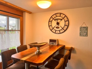 Wohnzimmer mit Essbereich - Ferienhaus Belvair