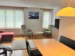 Wohnzimmer mit Essbereich - Ferienhaus Belvair