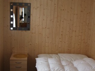 Schlafzimmer - Ferienhaus Bergfreund