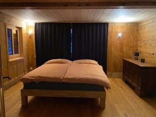Schlafzimmer - Ferienhaus Brünig