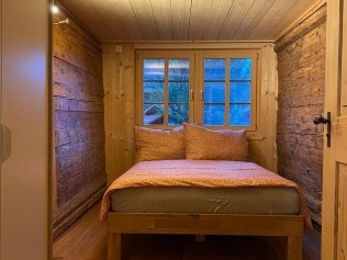 Schlafzimmer - Ferienhaus Brünig