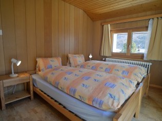 Schlafzimmer - Ferienhaus Brunner-Lauber