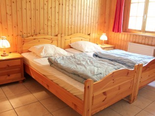 Schlafzimmer - Ferienhaus Dent-d'Hérens