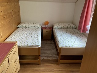 Schlafzimmer - Ferienhaus Dorfblick