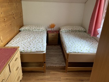 Schlafzimmer - Ferienhaus Dorfblick