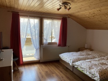 Schlafzimmer - Ferienhaus Dorfblick