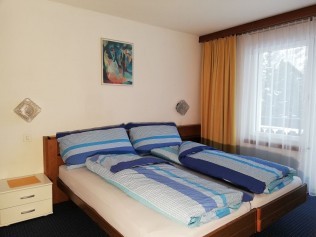 Schlafzimmer - Ferienhaus Floralpina