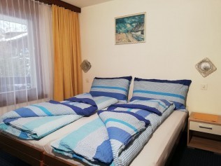 Schlafzimmer - Ferienhaus Floralpina