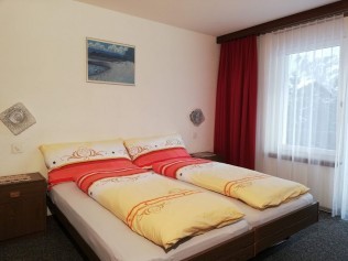 Schlafzimmer - Ferienhaus Floralpina
