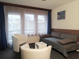 Wohnzimmer - Ferienhaus Floralpina