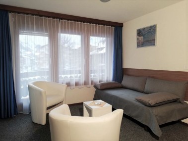 Wohnzimmer - Ferienhaus Floralpina