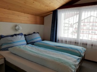 Schlafzimmer - Ferienhaus Floralpina
