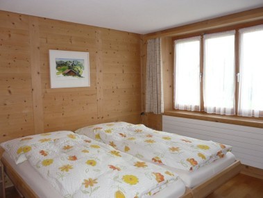 Schlafzimmer - Ferienhaus Flüehblüemli