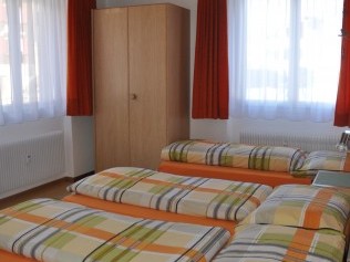 Schlafzimmer - Ferienhaus Fortuna