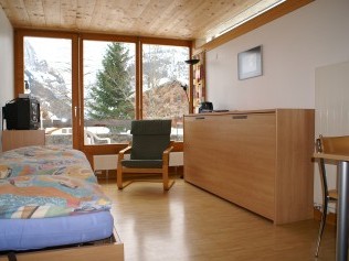 Wohn- und Schlafzimmer - Ferienhaus FSG Grindelwald