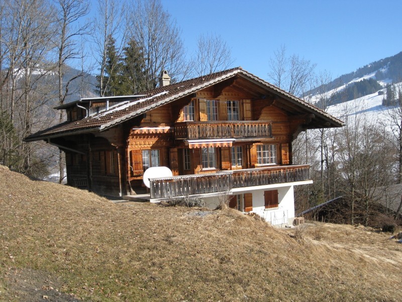 Exterior view in summer - Holiday house Gürütsch Gstaad